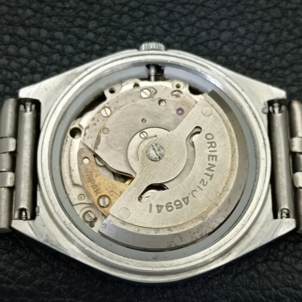 Vintage 1982 Orient Automatic Mens Silver Watch W/daydate & Blue accents